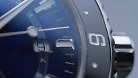 Aquis GMT Date