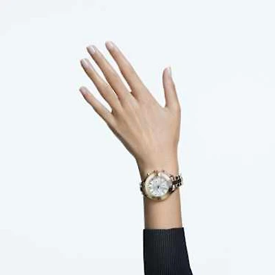 Octea lux sport watch, Swiss Made, Metal bracelet, Gold tone, Champagne gold-tone finish by SWAROVSKI