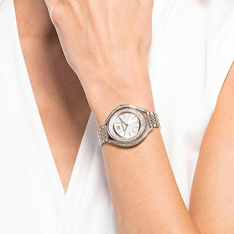 Crystalline aura watch, Swiss Made, Metal bracelet, Gold tone, Champagne gold-tone finish by SWAROVSKI