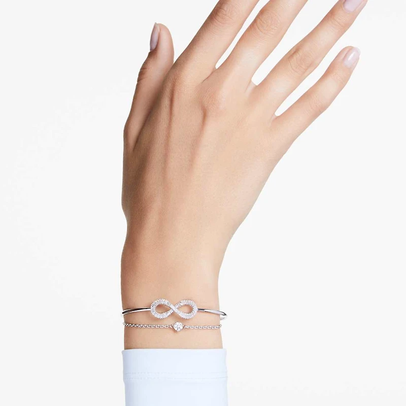Hyperbola bangle, Infinity, White, Rhodium plated by SWAROVSKI