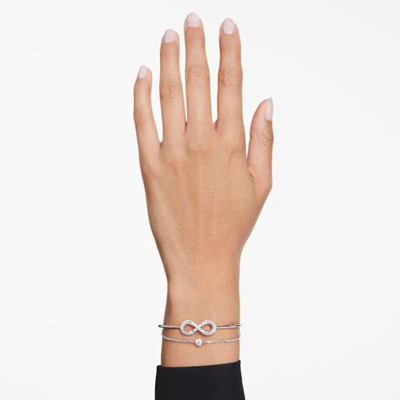 Hyperbola bangle, Infinity, White, Rhodium plated by SWAROVSKI