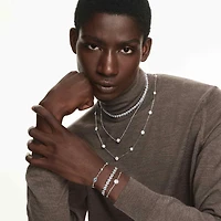 Una Angelic pendant, Round cut, Double sided motifs, White, Rhodium plated by SWAROVSKI