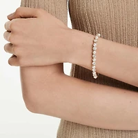 Matrix Tennis bracelet, Crystal pearl, Round cut, White, 18K gold finish