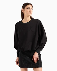Oversized sweatshirt with wavy bottom and rhinestones