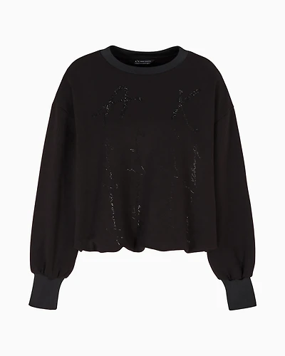 Oversized sweatshirt with wavy bottom and rhinestones