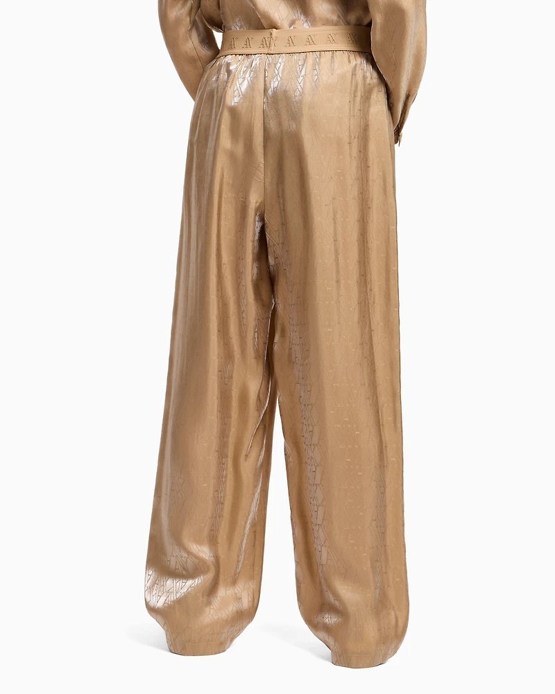 Oversized viscose trousers with allover logo