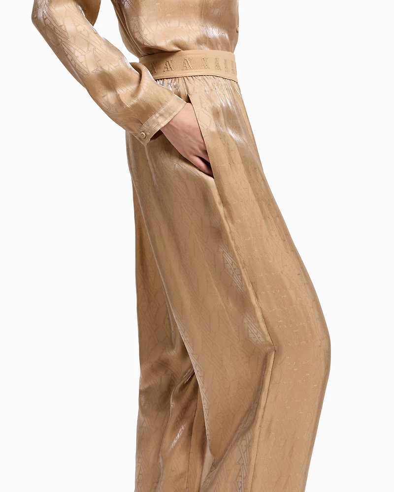 Oversized viscose trousers with allover logo