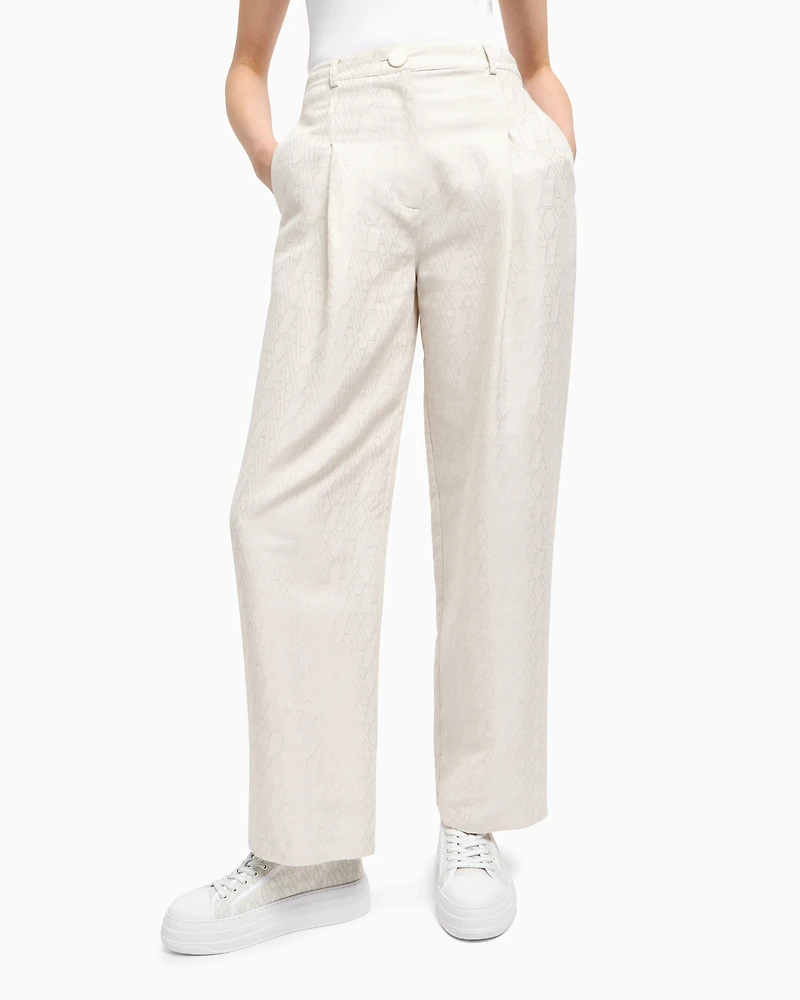 Pleated trousers with allover logo
