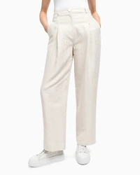 Pleated trousers with allover logo