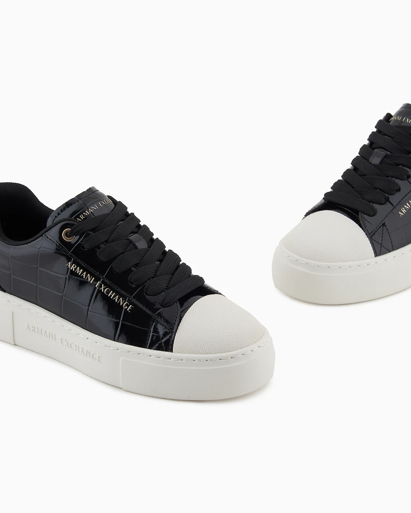 Sneakers with shiny crocodile-effect upper