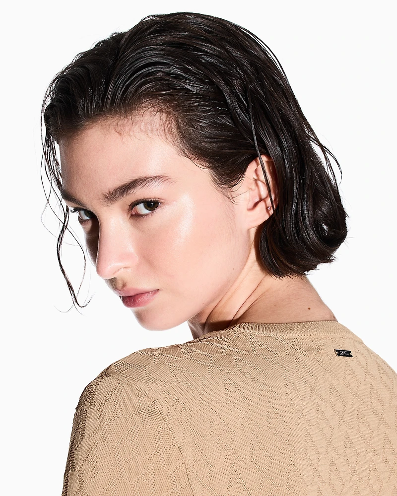 Sweater with allover jacquard logo