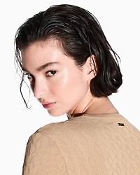 Sweater with allover jacquard logo