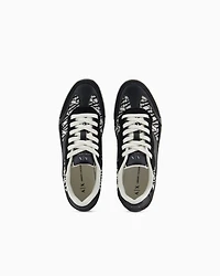 Sneakers with allover logo inserts