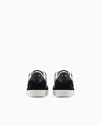 Sneakers with allover logo inserts