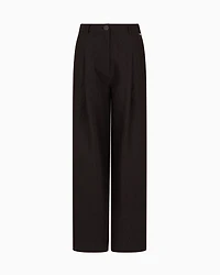 Pleated trousers with allover logo