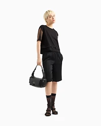 Cropped T-shirt with shaped bottom