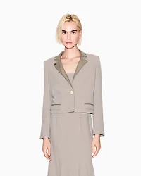 Short jacket with metal details