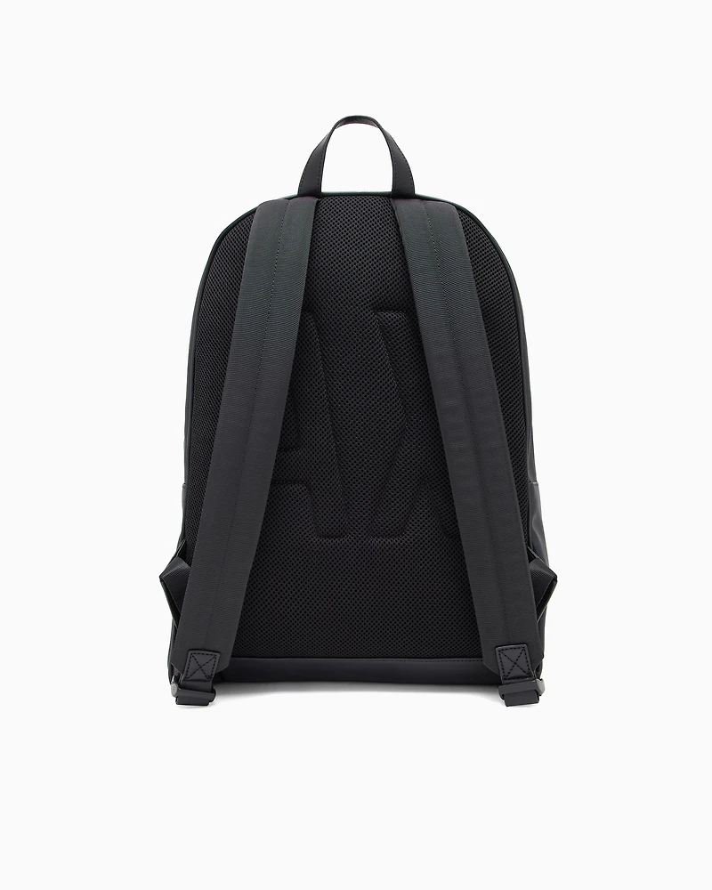 Backpack with monogram and stripes
