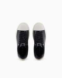 Sneakers with shiny crocodile-effect upper