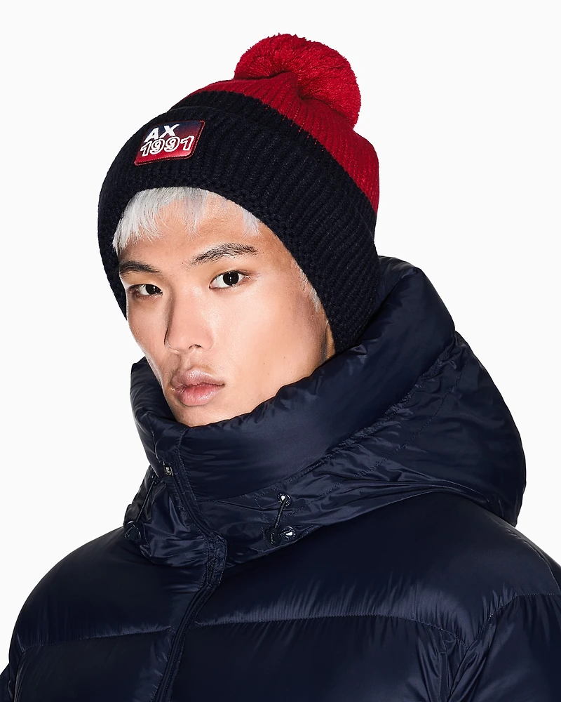 Ribbed knit hat with pompom