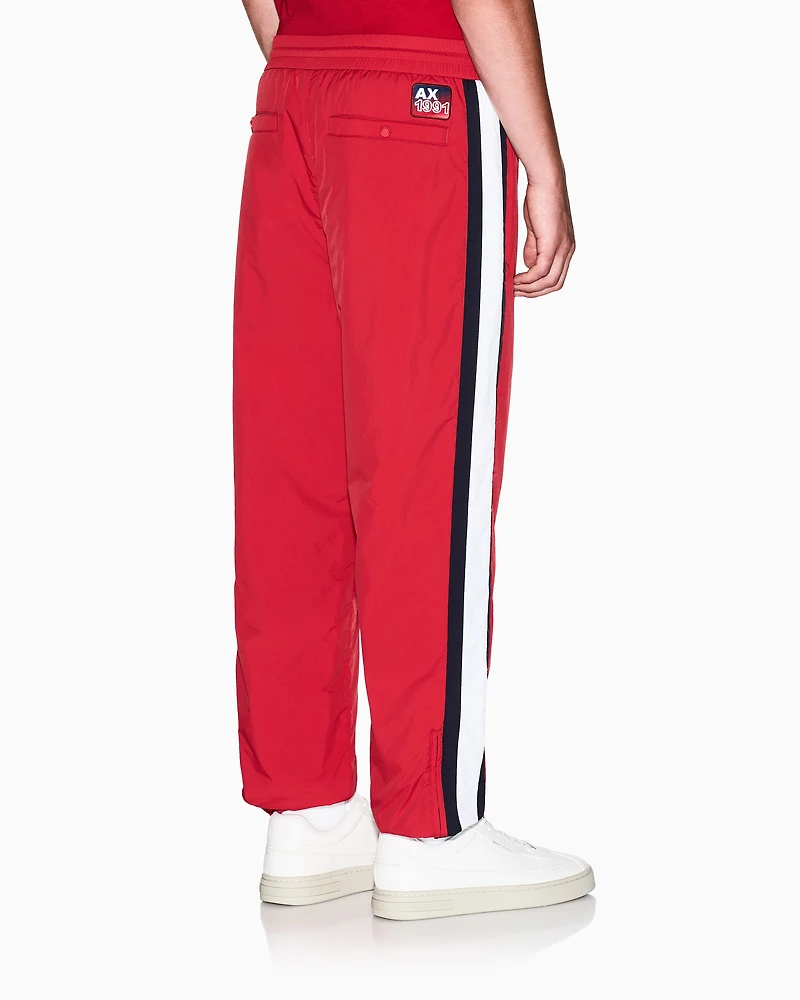 Trousers with side stripes