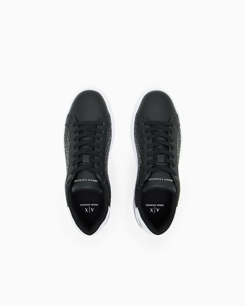 Lace-up sneakers with allover embossed logo