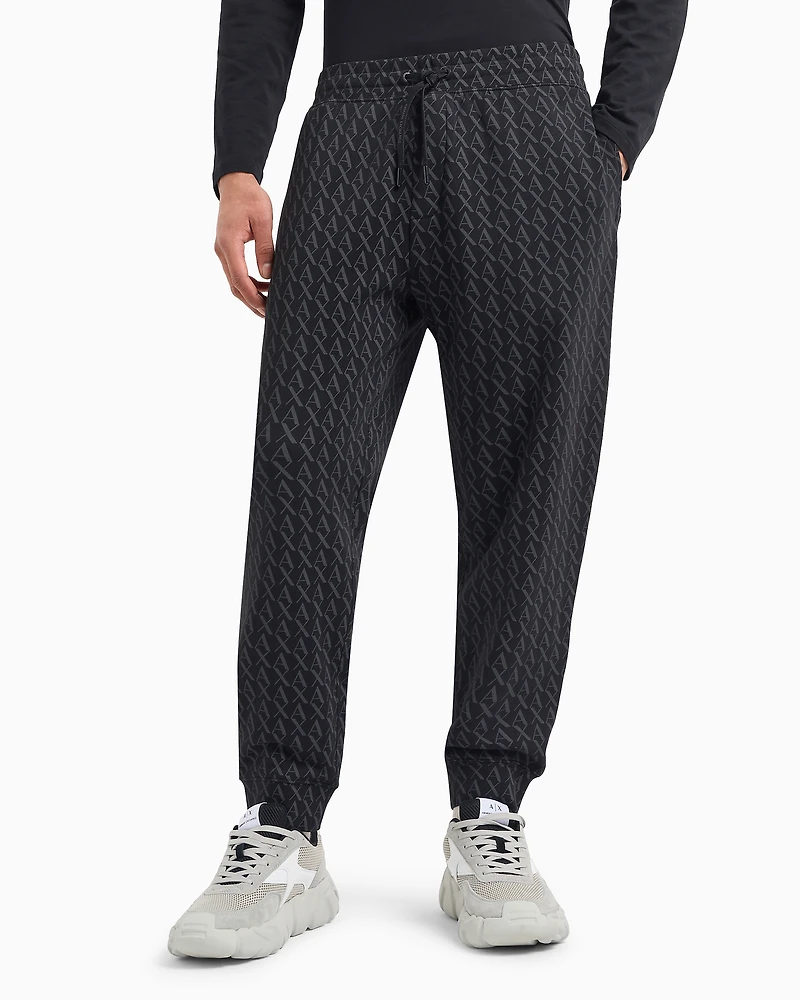 Jogger pants fabric with allover logo pattern