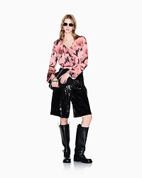 Blouse with flared sleeves