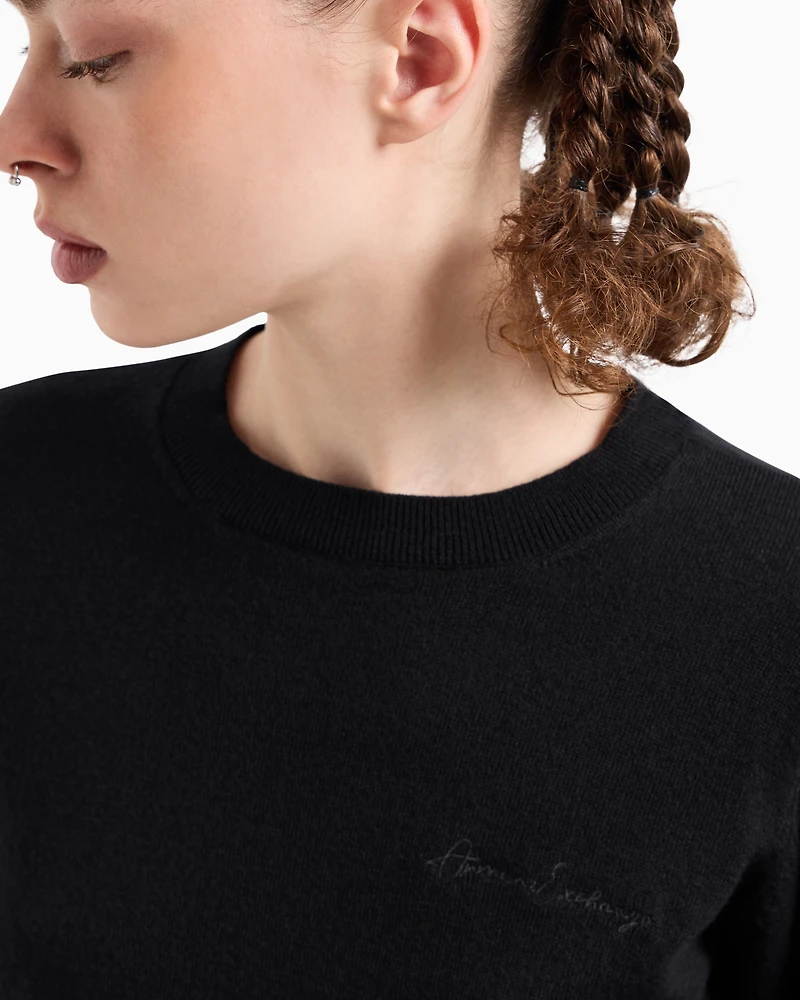Round neck sweater with embroidered logo