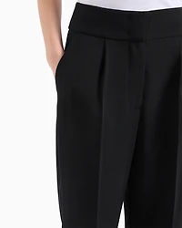ASV fabric trousers with pleats and turn-ups at the bottom