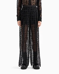 Sheer wide leg trousers with allover logo