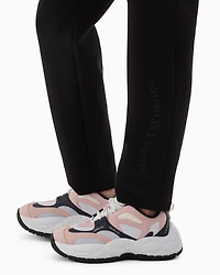 Stretch fabric jogger pants with rhinestone logo