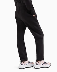 Stretch fabric jogger pants with rhinestone logo