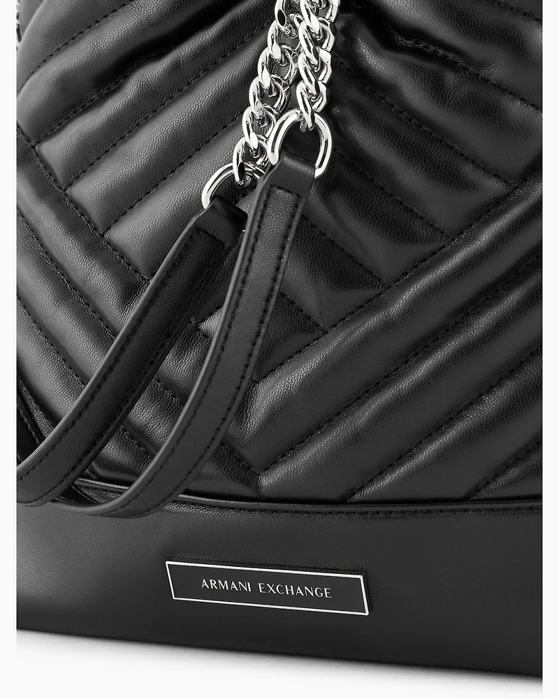 Bucket bag in quilted material with metal details