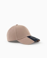 Cap with visor and logo patch