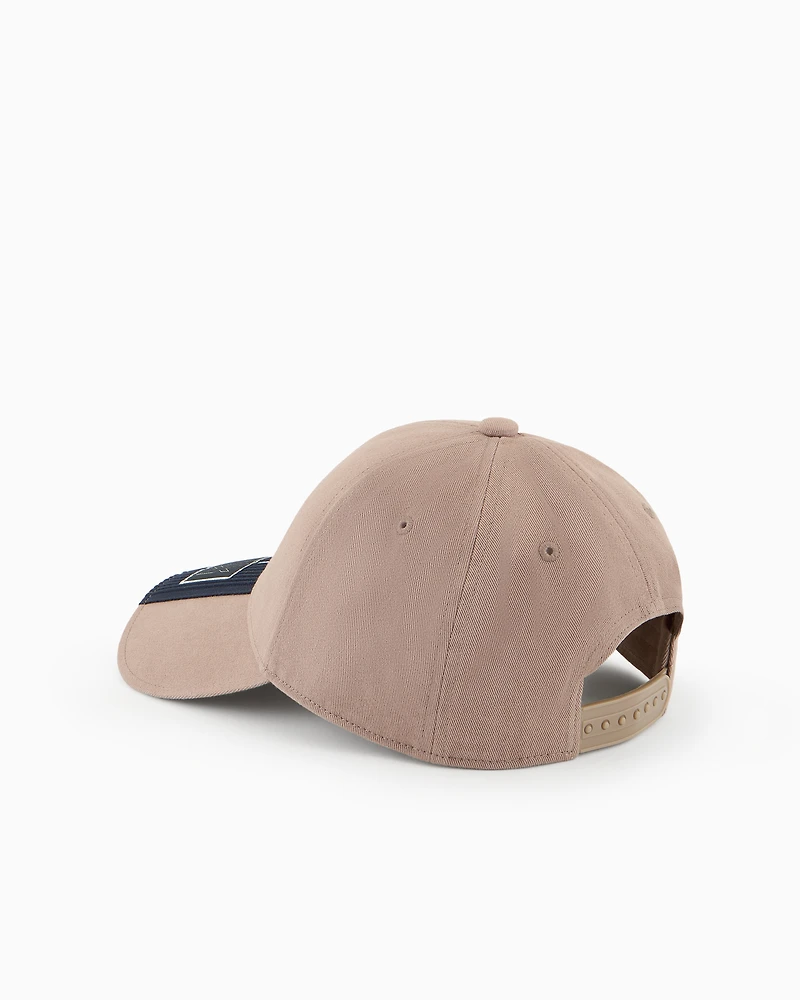 Cap with visor and logo patch