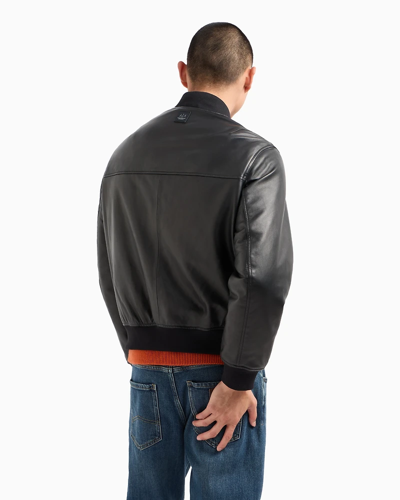 Leather jacket with fabric details