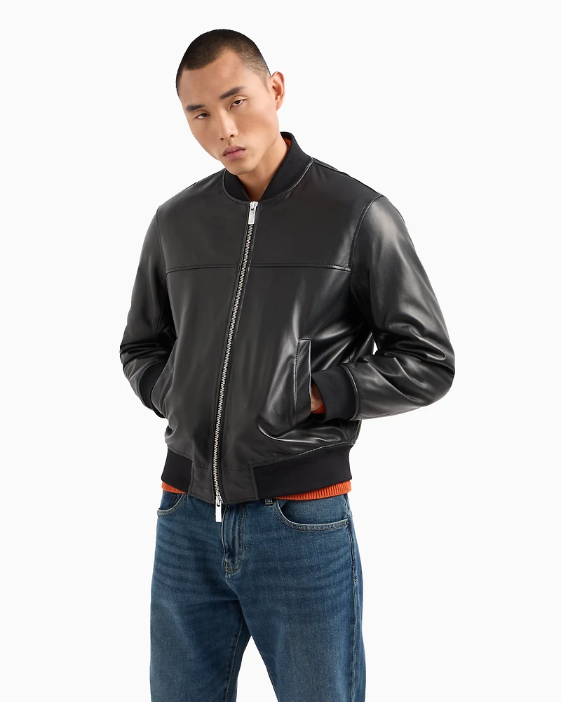 Leather jacket with fabric details