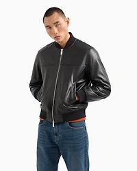 Leather jacket with fabric details