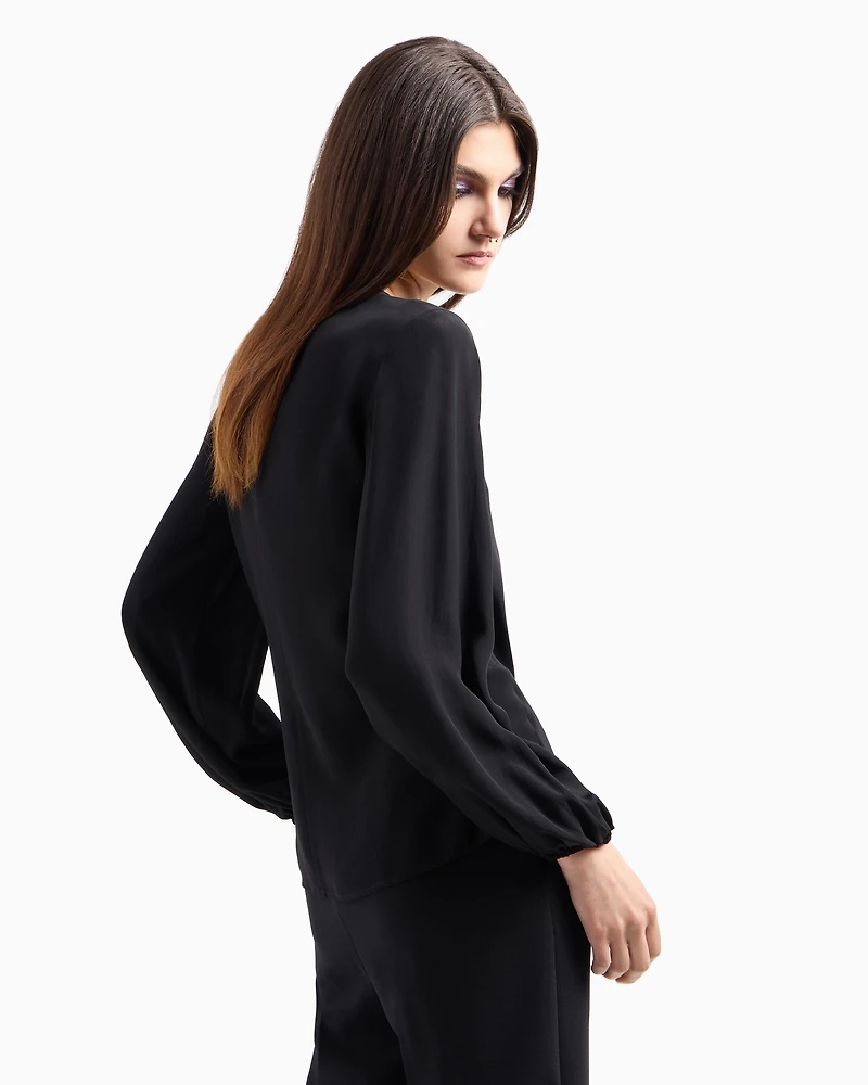 Asymmetrical crepe blouse with pleats