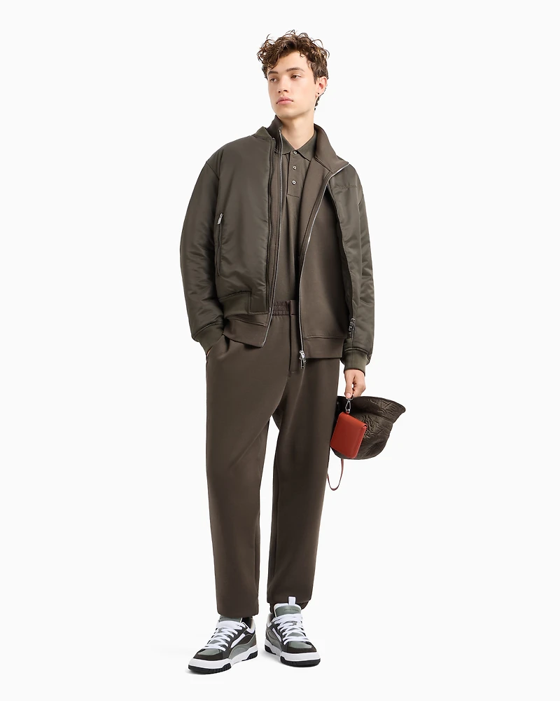 Oversized trousers with zip pocket