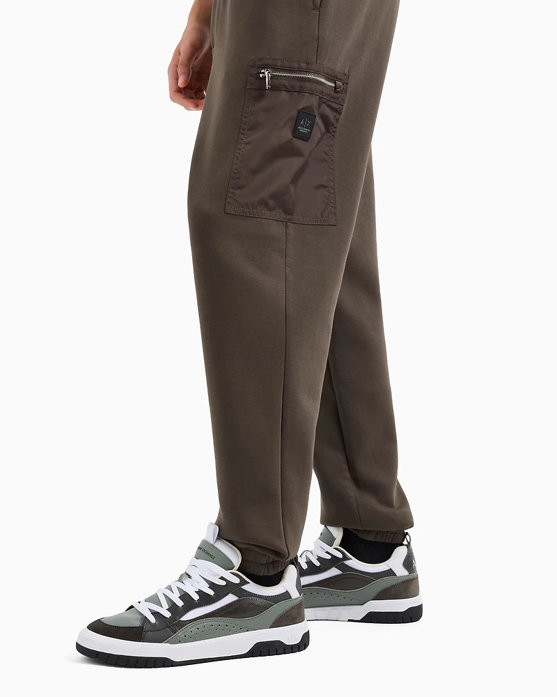 Oversized trousers with zip pocket