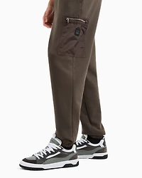 Oversized trousers with zip pocket