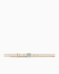 Metallic effect belt with rhinestone logo
