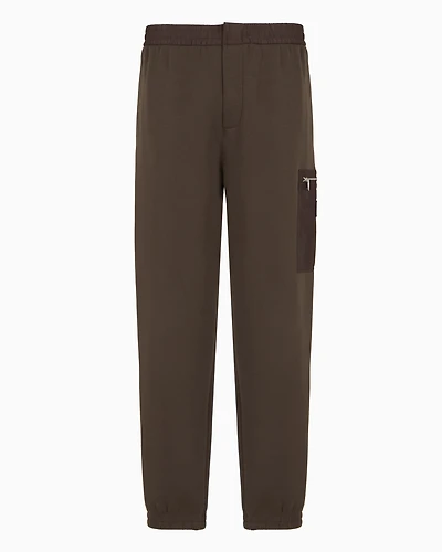 Oversized trousers with zip pocket
