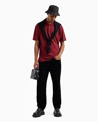 Short-sleeved polo shirt with metallic profile logo