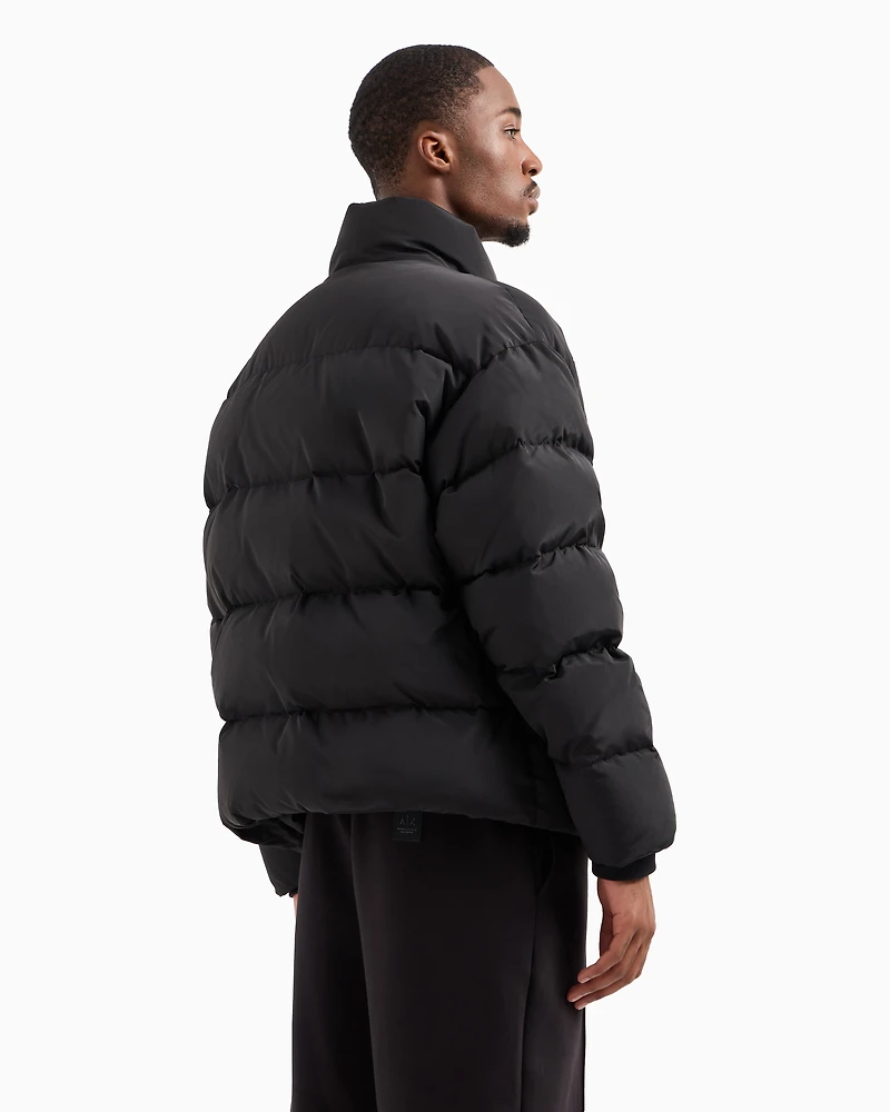Padded and quilted jacket with high collar