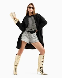 Knitted sweater with edge