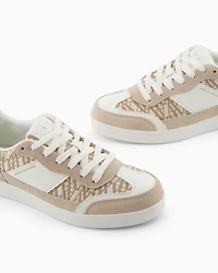 Sneakers with allover logo inserts