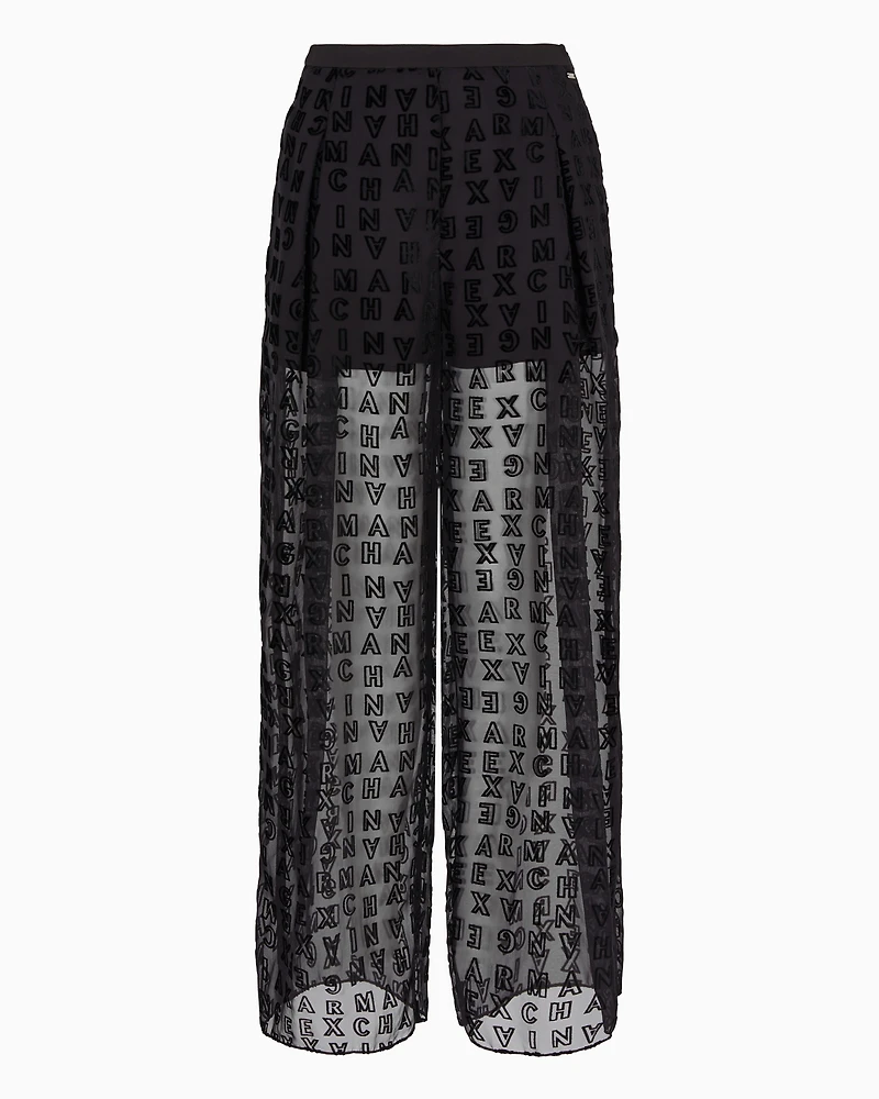 Sheer wide leg trousers with allover logo